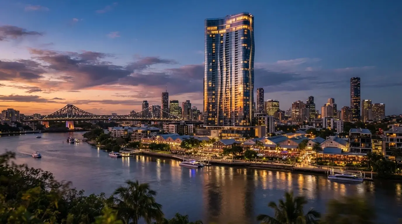 The Star Grand hotel tower rising above the Queen's Wharf precinct at dusk with city skyline behind
